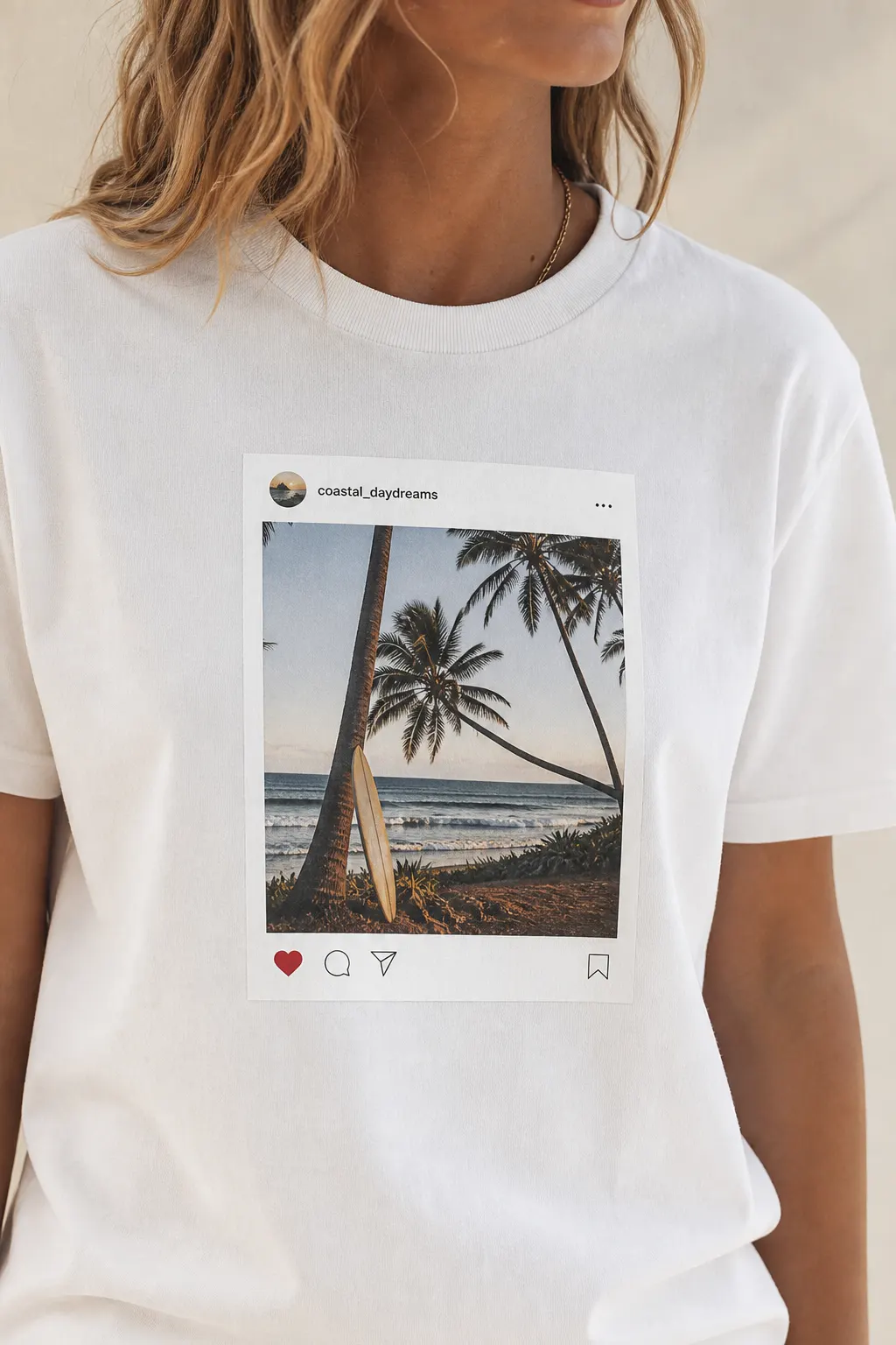 Person wearing a white tee with an Instagram print on the chest